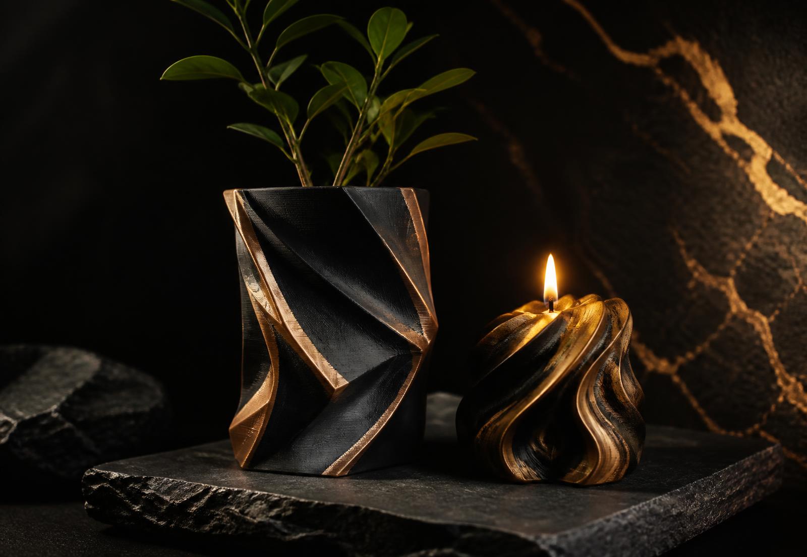 A 3D printed geometric vase holding a plant beside a lit sculptural candle